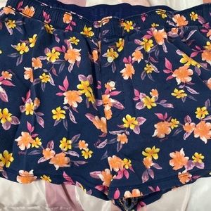 Dark blue floral pajamas shorts from pink, “boxy” sleep shorts